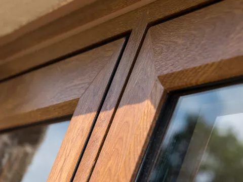 A close-up of a flush casement window