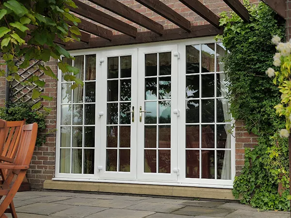 White French doors with a grid glass pattern